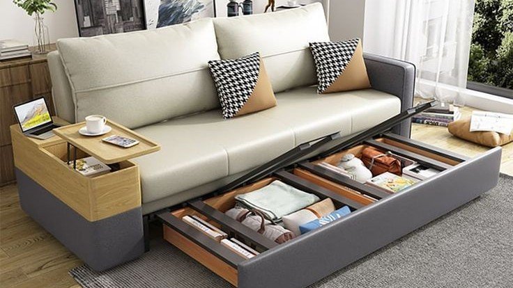 Modern sofa bed in a compact living room.